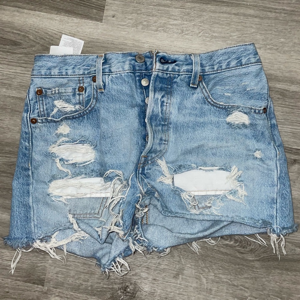 Levi’s 501 distressed high waisted denim shorts